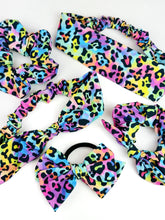 Load image into Gallery viewer, Stretch Back Headband with Bow | Neon Leopard | One Size Fits Most {PRE-ORDER}
